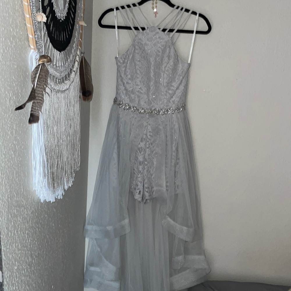 Sleeveless short in the front and long in the back sheer fabric with shorts